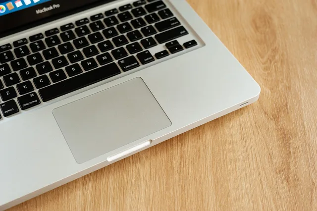 laptop, touchpad, desk, device, portable computer, computer, technology, workspace, office, macbook, apple, touchpad, touchpad, touchpad, touchpad, touchpad. How to write job adverts that attract the right talent
